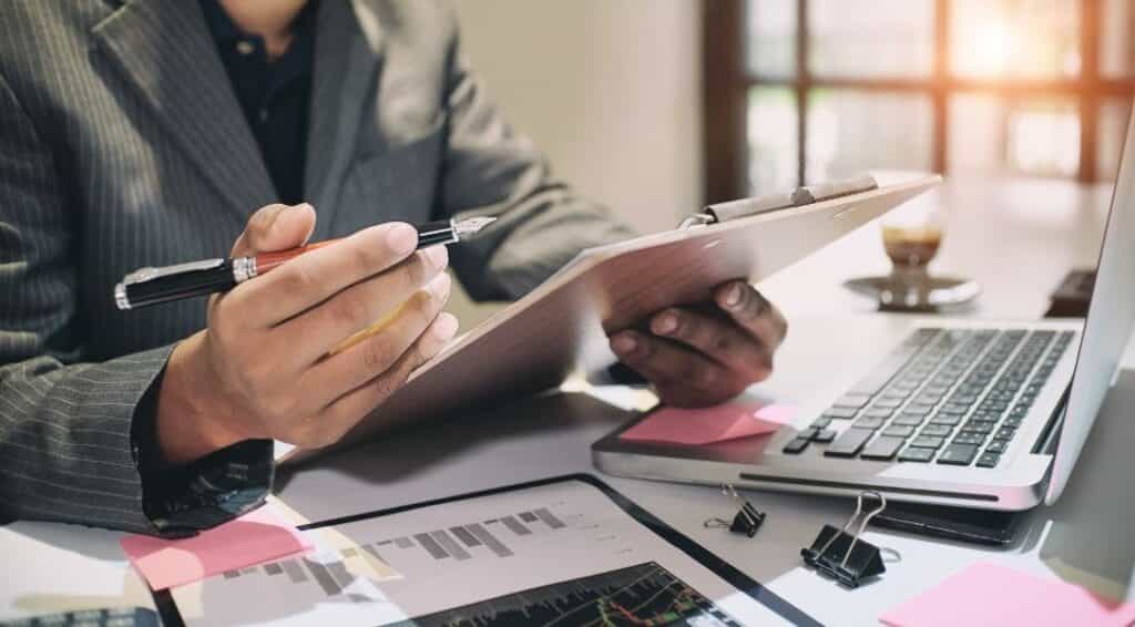 New auditors practicing internal audit techniques in a hands-on training environment.
