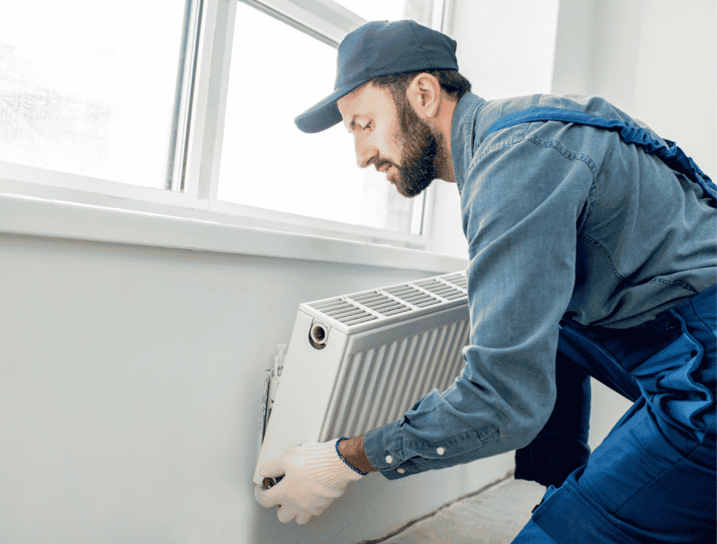Professional performing a compliance audit to ensure retrofit projects meet Birmingham regulations.